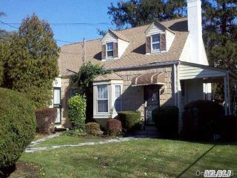 108 Beverly Road Hempstead, NY 11550 - Photo 1 of 1 a view of a house with a yard and plants