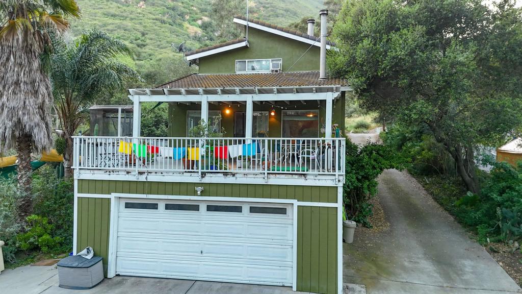 9237 Harmony Grove Road Escondido, CA 92029 - Photo 2 of 56 a house view with a outdoor space