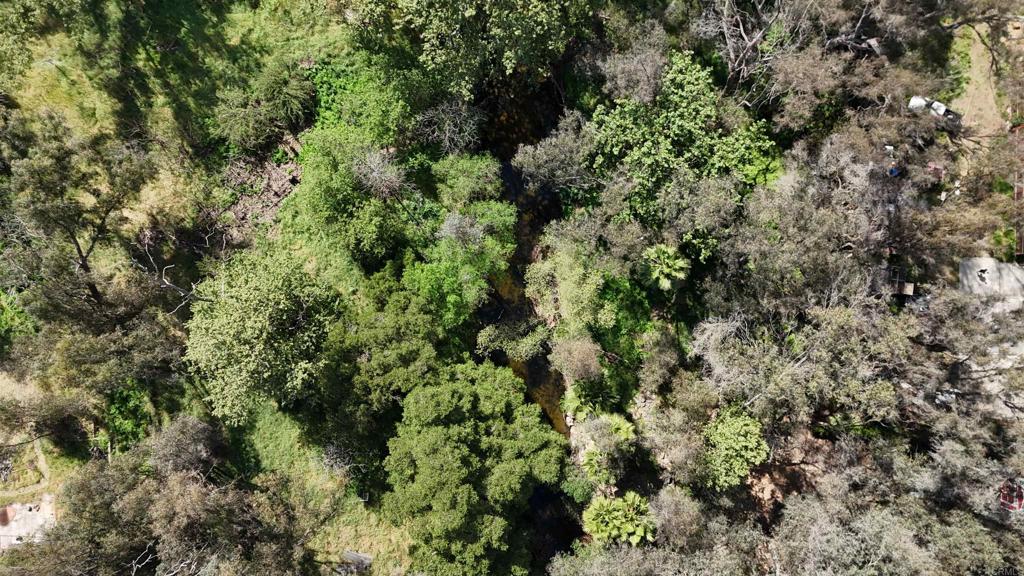 9237 Harmony Grove Road Escondido, CA 92029 - Photo 21 of 56 an aerial view of a house with a yard