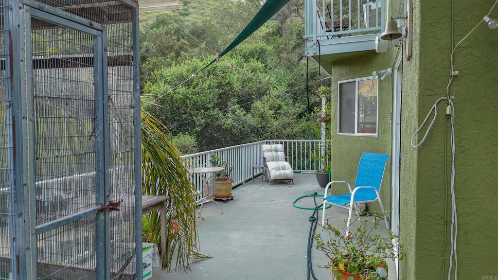 9237 Harmony Grove Road Escondido, CA 92029 - Photo 28 of 56 a view of roof deck with table and chairs