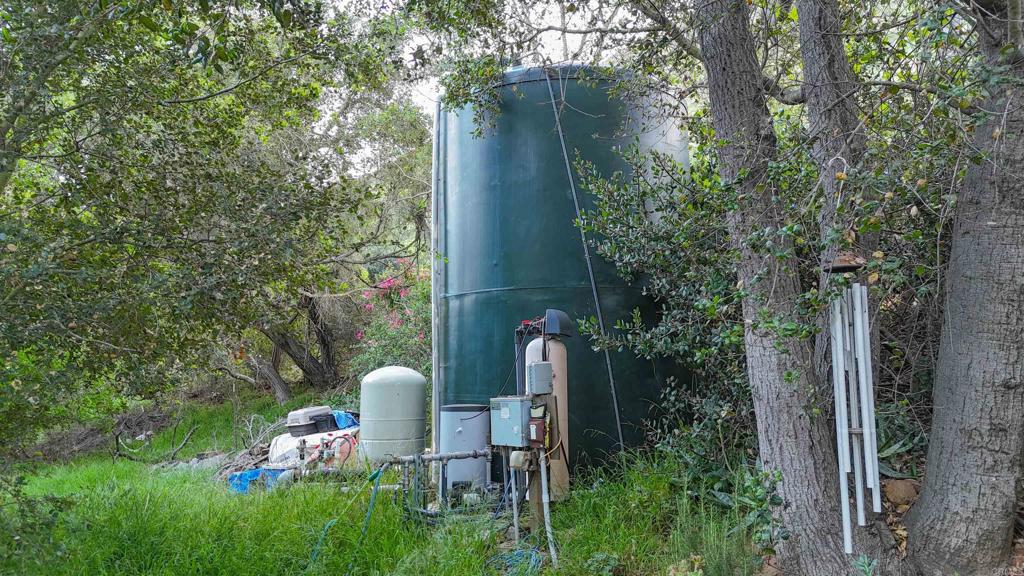 9237 Harmony Grove Road Escondido, CA 92029 - Photo 50 of 56 a view of a chair and table in the garden