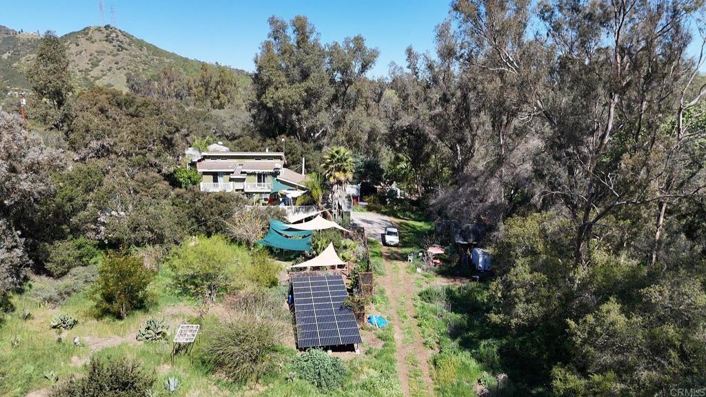 9237 Harmony Grove Road Escondido, CA 92029 - Photo 6 of 56 an aerial view of a house with a yard