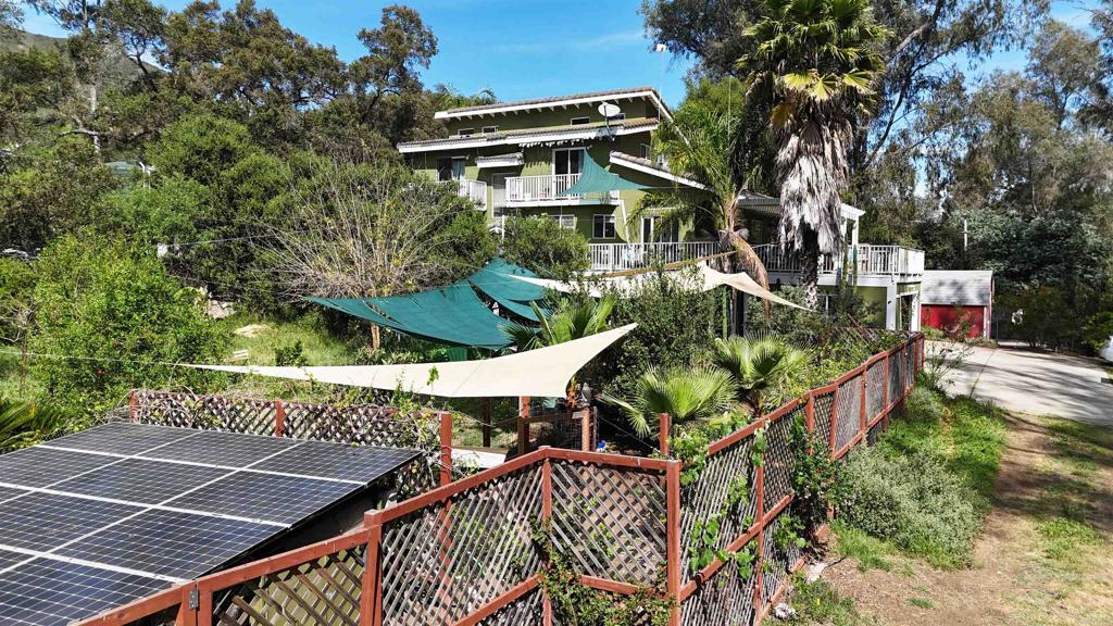 9237 Harmony Grove Road Escondido, CA 92029 - Photo 8 of 56 a view of a chairs and table in the patio