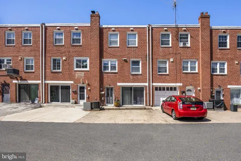 a car parked in front of a building