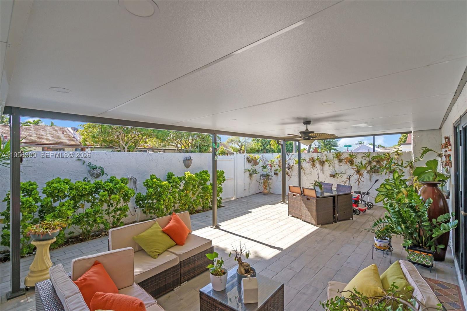9466 Southwest 6th Lane Miami, FL 33174 - Photo 25 of 34 a outdoor living space with furniture and garden view