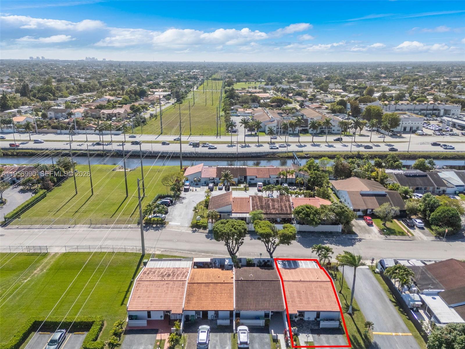 9466 Southwest 6th Lane Miami, FL 33174 - Photo 27 of 34 an aerial view of a building with garden space and ocean view