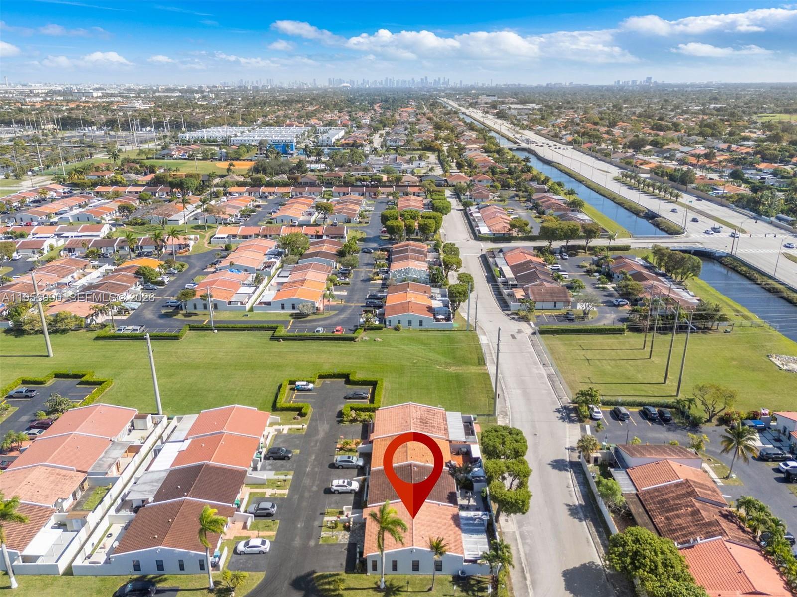 9466 Southwest 6th Lane Miami, FL 33174 - Photo 32 of 34 an aerial view of residential building and lake