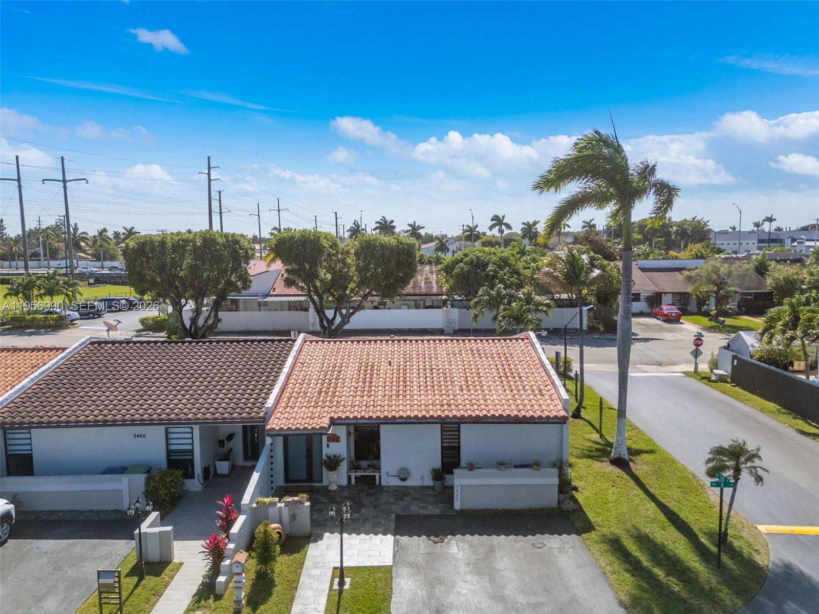 9466 Southwest 6th Lane Miami, FL 33174 - Photo 34 of 34 a small garden covered with tall buildings