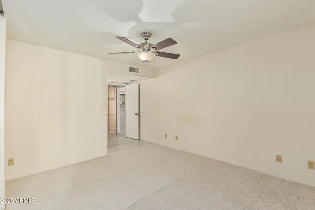 a bathroom with a sink shower and a mirror