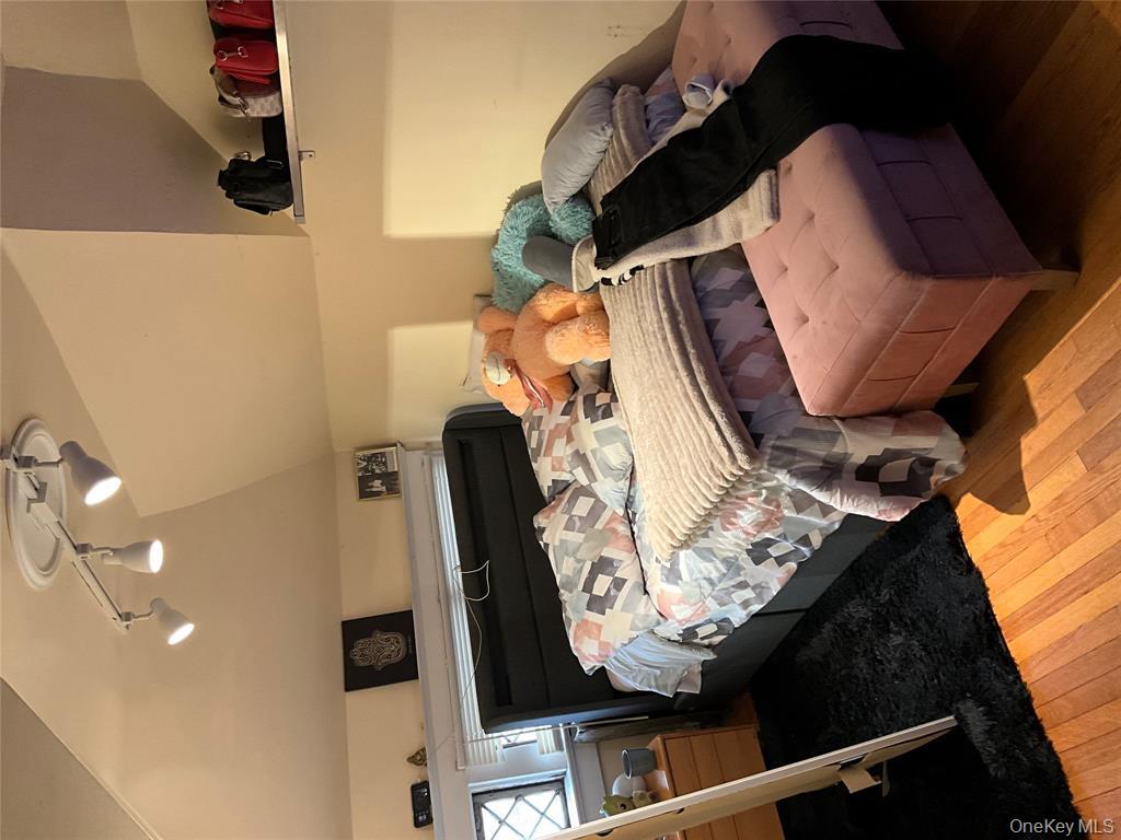 265 Spring Street Monroe, NY 10950 - Photo 19 of 20 a bedroom with a bed and a dresser