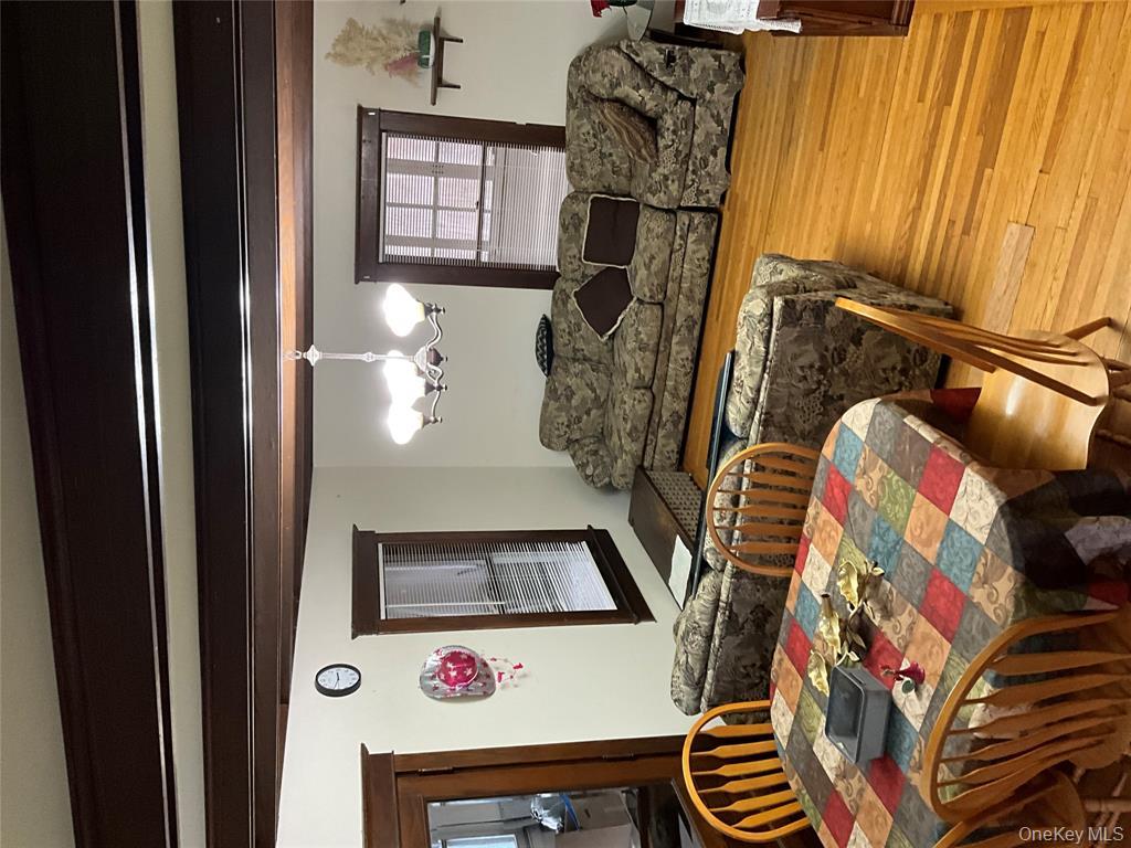 265 Spring Street Monroe, NY 10950 - Photo 8 of 20 a living room with furniture and a table