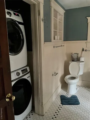 a bathroom with a toilet and a sink