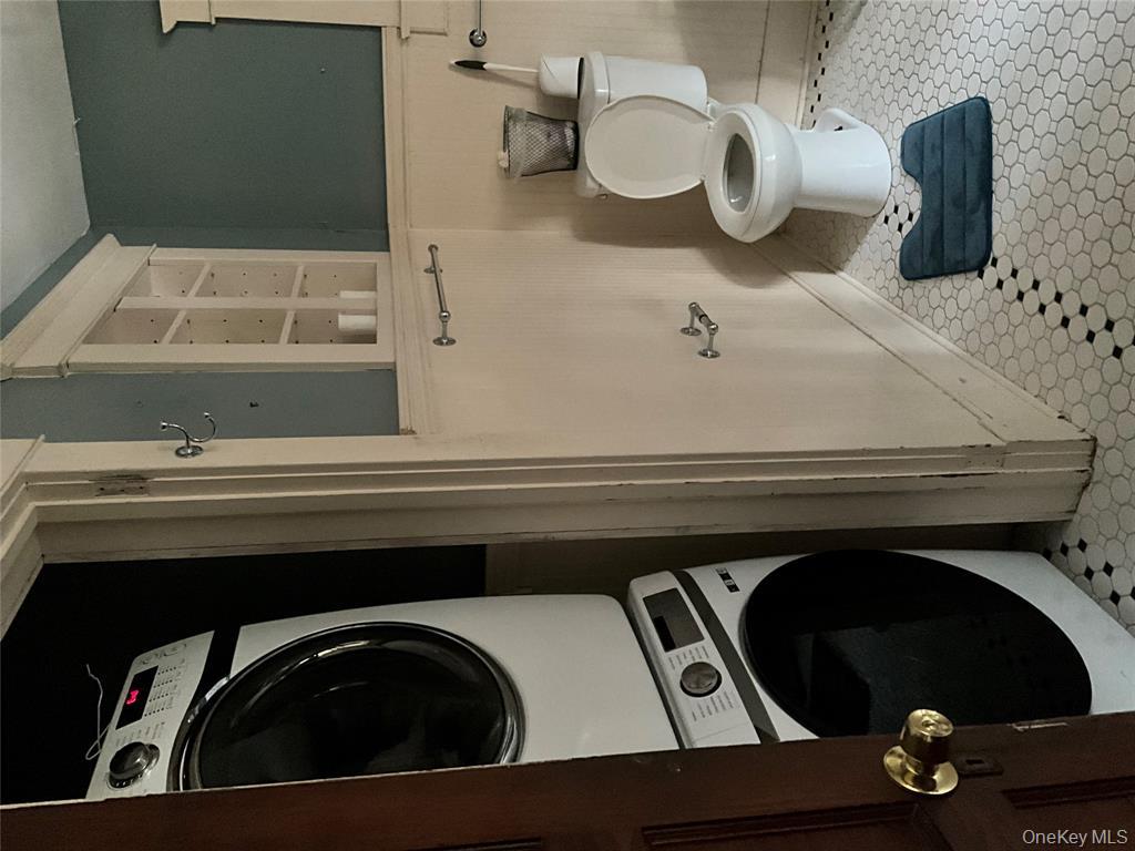 265 Spring Street Monroe, NY 10950 - Photo 10 of 20 a bathroom with a toilet and a sink