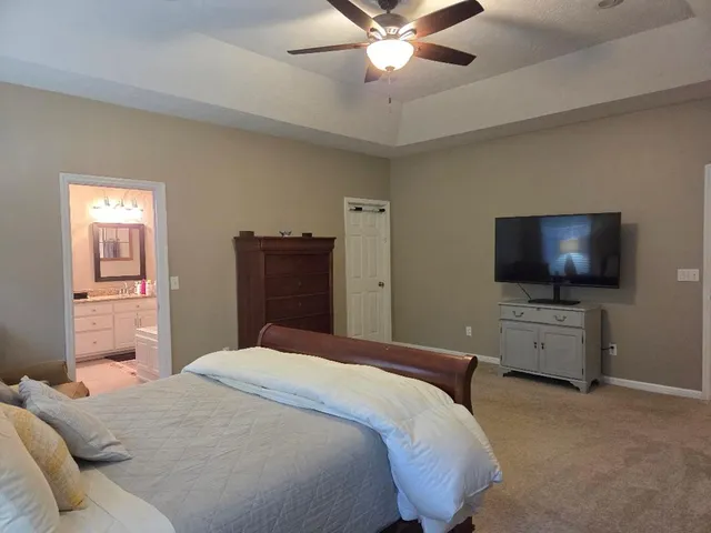 a bathroom with a sink double vanity and a mirror