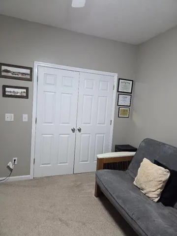 a room with furniture and wooden floor