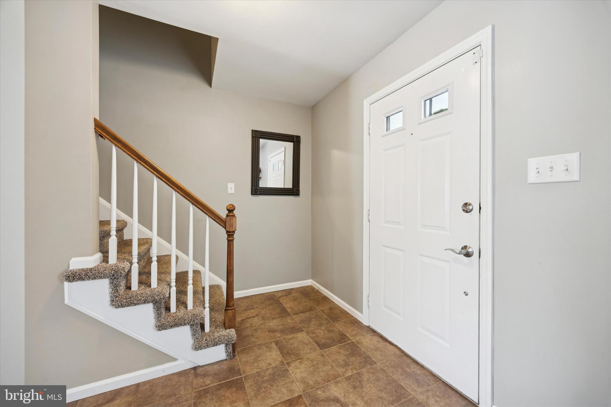 132 Rugby Road Birdsboro, PA 19508 - Photo 14 of 25 Welcoming entryway with stylish staircase.