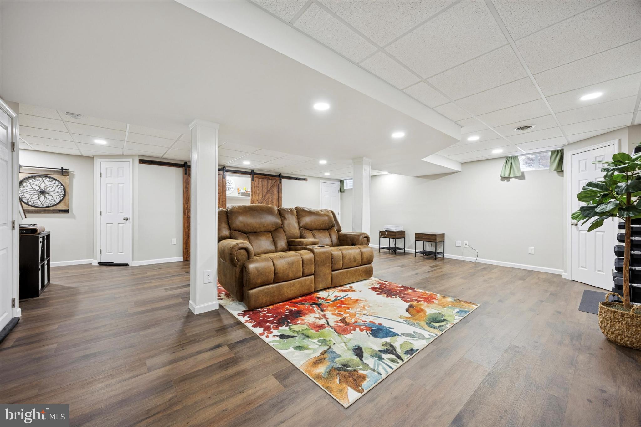 132 Rugby Road Birdsboro, PA 19508 - Photo 22 of 25 Spacious basement with vibrant decor.