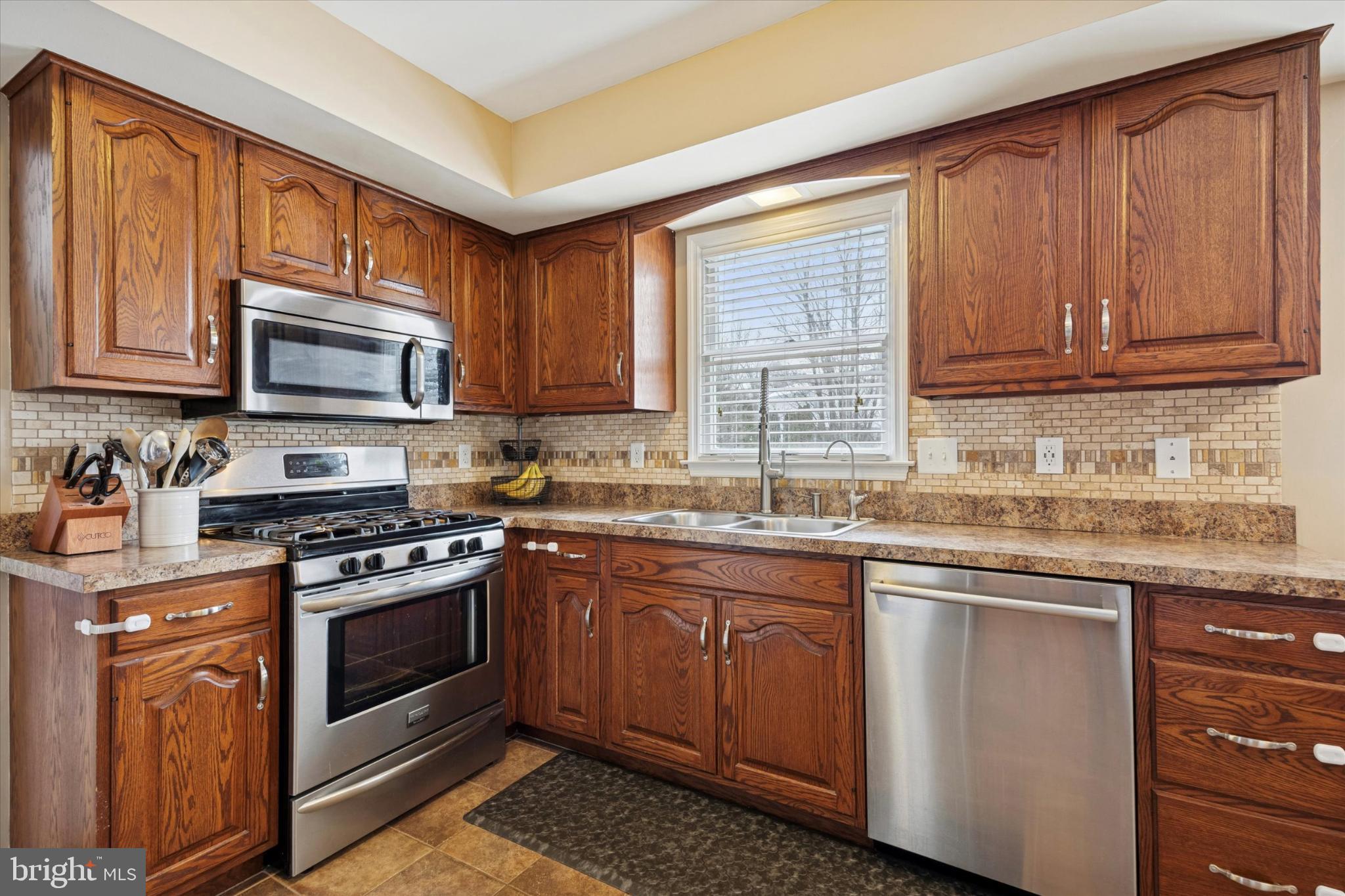 132 Rugby Road Birdsboro, PA 19508 - Photo 4 of 25 Warm wood tones in a modern kitchen.