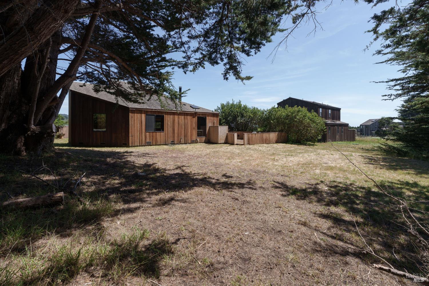 39412 Pacific Reach The Sea Ranch, CA 95497 - Photo 2 of 31 a view of a house with a yard