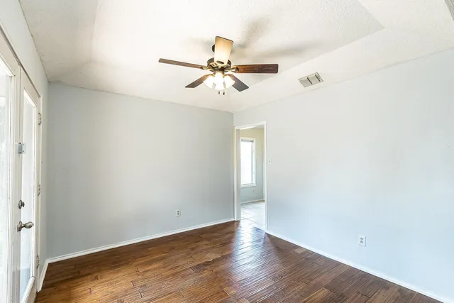 a kitchen with stainless steel appliances granite countertop a sink and a refrigerator