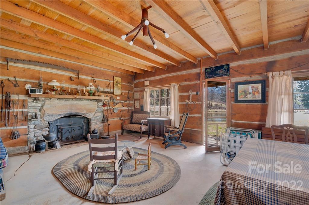 1715 Thickety Road Clyde, NC 28721 - Photo 21 of 25 a living room with furniture and a fireplace