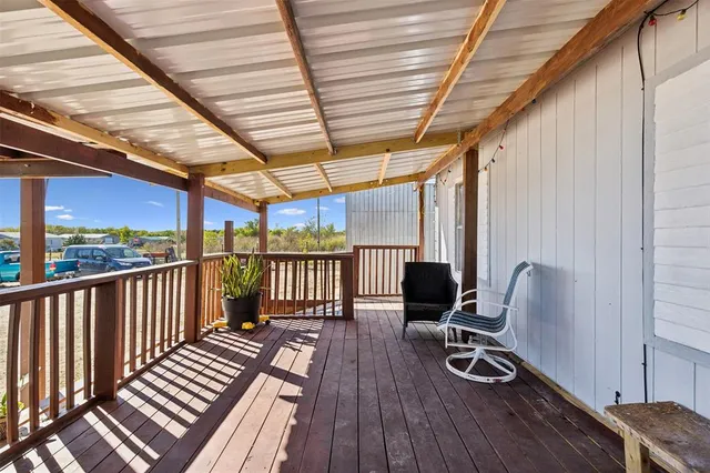 a view of chairs in wooden floor