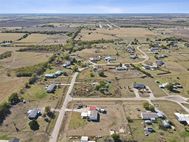 an aerial view of beach and ocean
