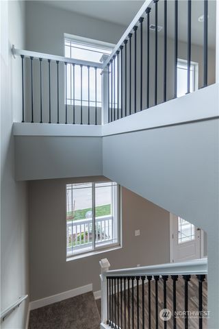 a view of livingroom with furniture and windows