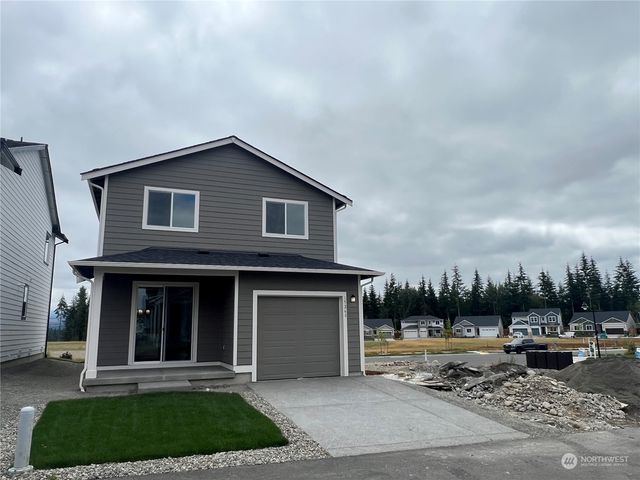 a view of a lake with a houses