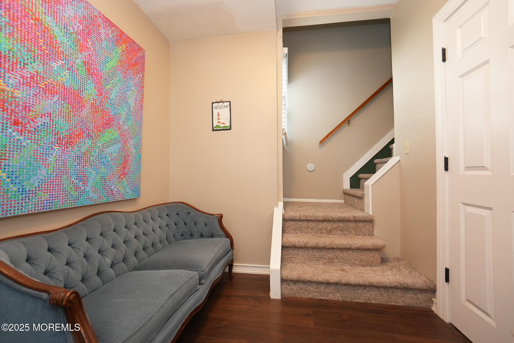 201 Forman Avenue Point Pleasant Beach, NJ 08742 - Photo 11 of 54 a living room with furniture and stairs