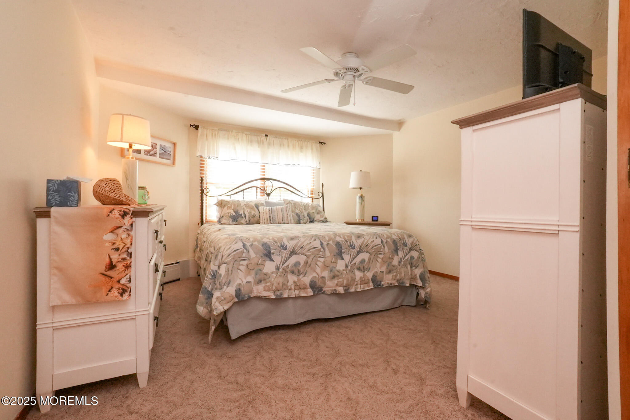 201 Forman Avenue Point Pleasant Beach, NJ 08742 - Photo 17 of 54 a bedroom with a bed and a refrigerator