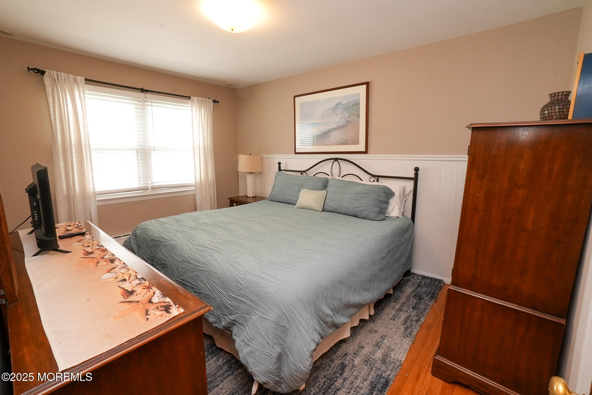 201 Forman Avenue Point Pleasant Beach, NJ 08742 - Photo 20 of 54 a bedroom with a bed and a window