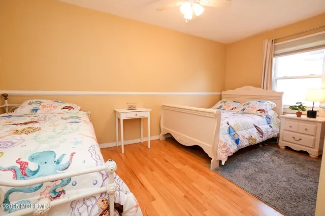 a view of living room filled with furniture and furniture