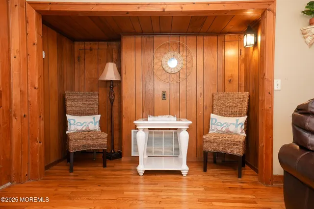 a bedroom with a bed and a table