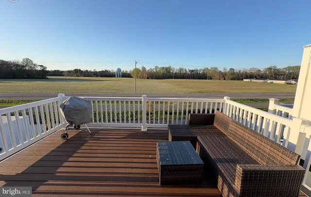 a view of wooden floor with a lake