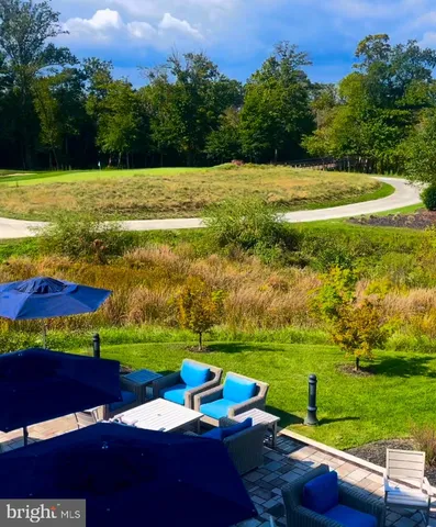 a view of building with green space