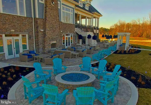 a picture of a table and chairs in the patio