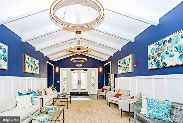 a kitchen with a sink a stove and cabinets