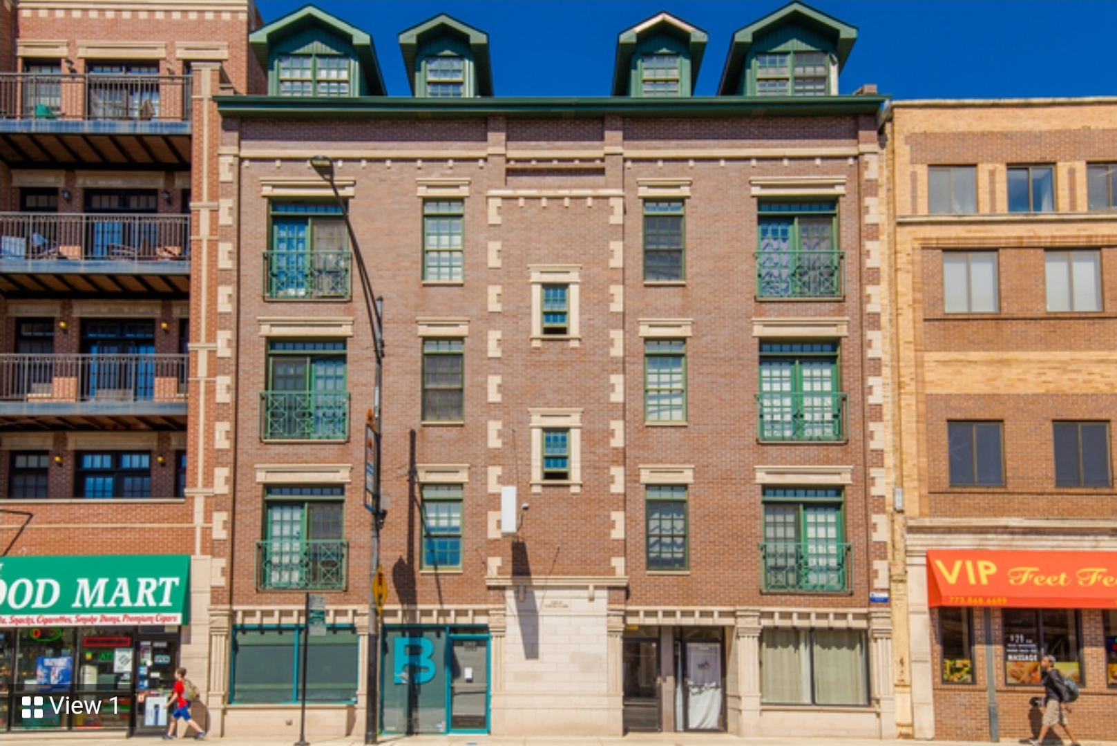 3349 North Clark Street, Unit 2SW Chicago, IL 60657 - Photo 1 of 13 a front view of a multi story building