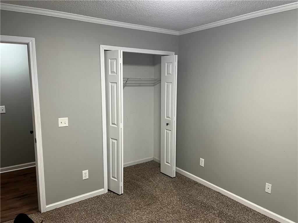 111 Green Point Way Carrollton, GA 30117 - Photo 19 of 29 an empty room and closet area