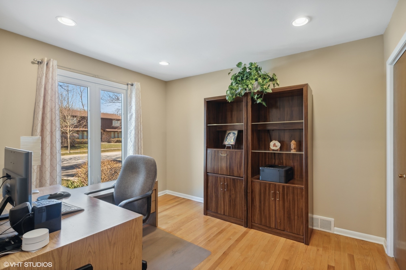3905 Rugen Road Glenview, IL 60025 - Photo 12 of 31 a livingroom with furniture window and wooden floor