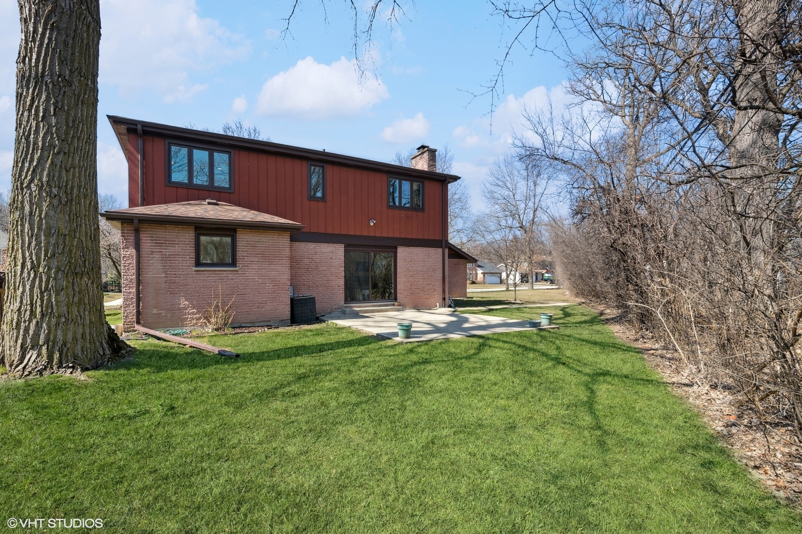 3905 Rugen Road Glenview, IL 60025 - Photo 26 of 31 a view of a house with a yard and sitting area