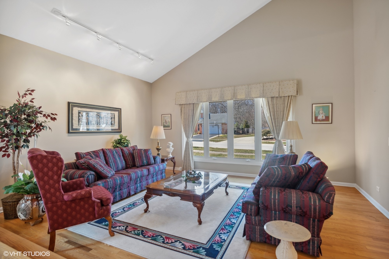 3905 Rugen Road Glenview, IL 60025 - Photo 5 of 31 a living room with furniture and a large window