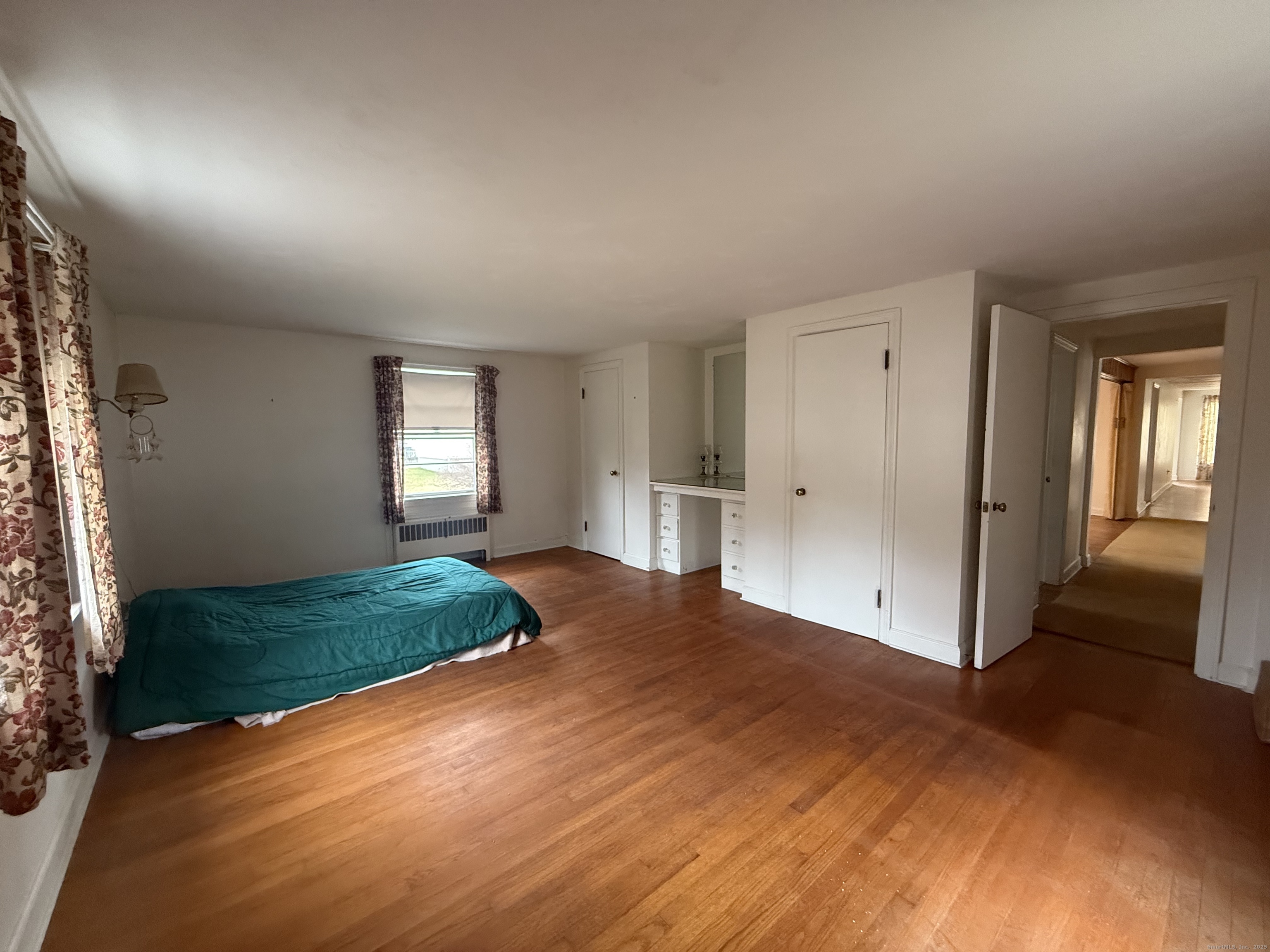 10 Top View Drive Thompson, CT 06262 - Photo 23 of 34 a view of empty room with window and wooden floor