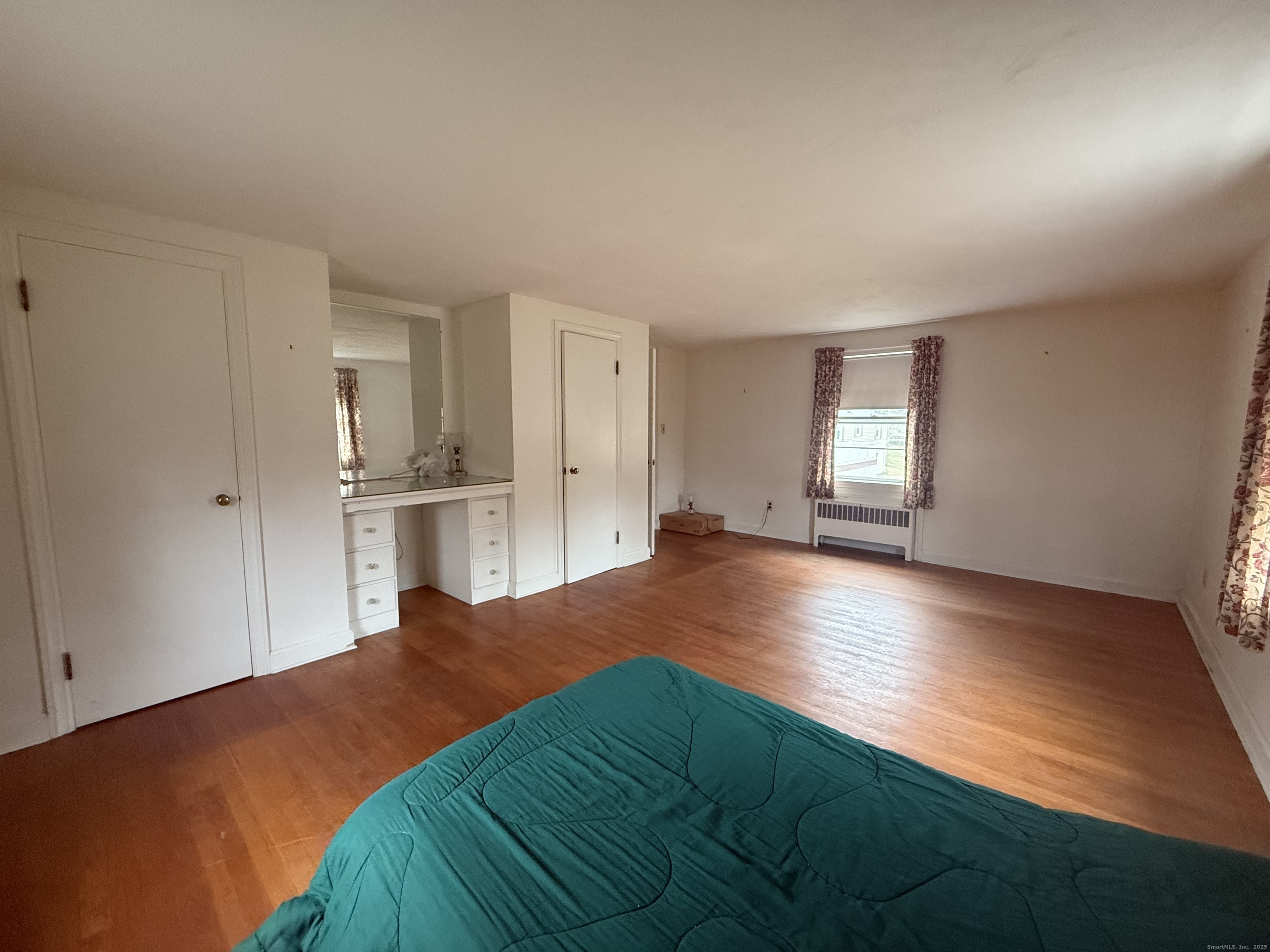 10 Top View Drive Thompson, CT 06262 - Photo 24 of 34 a view of empty room with wooden floor and window