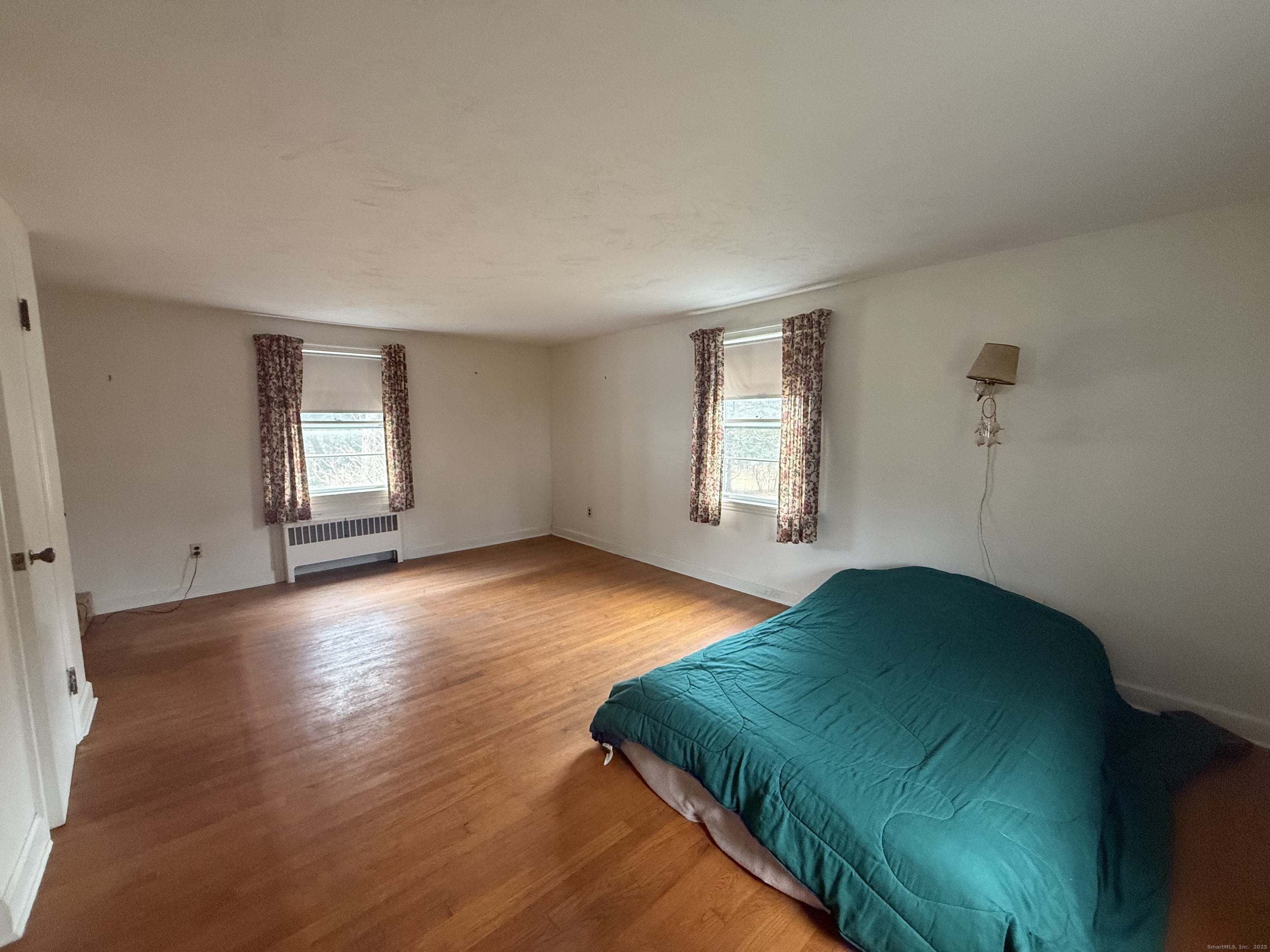 10 Top View Drive Thompson, CT 06262 - Photo 25 of 34 a bedroom with a bed and window