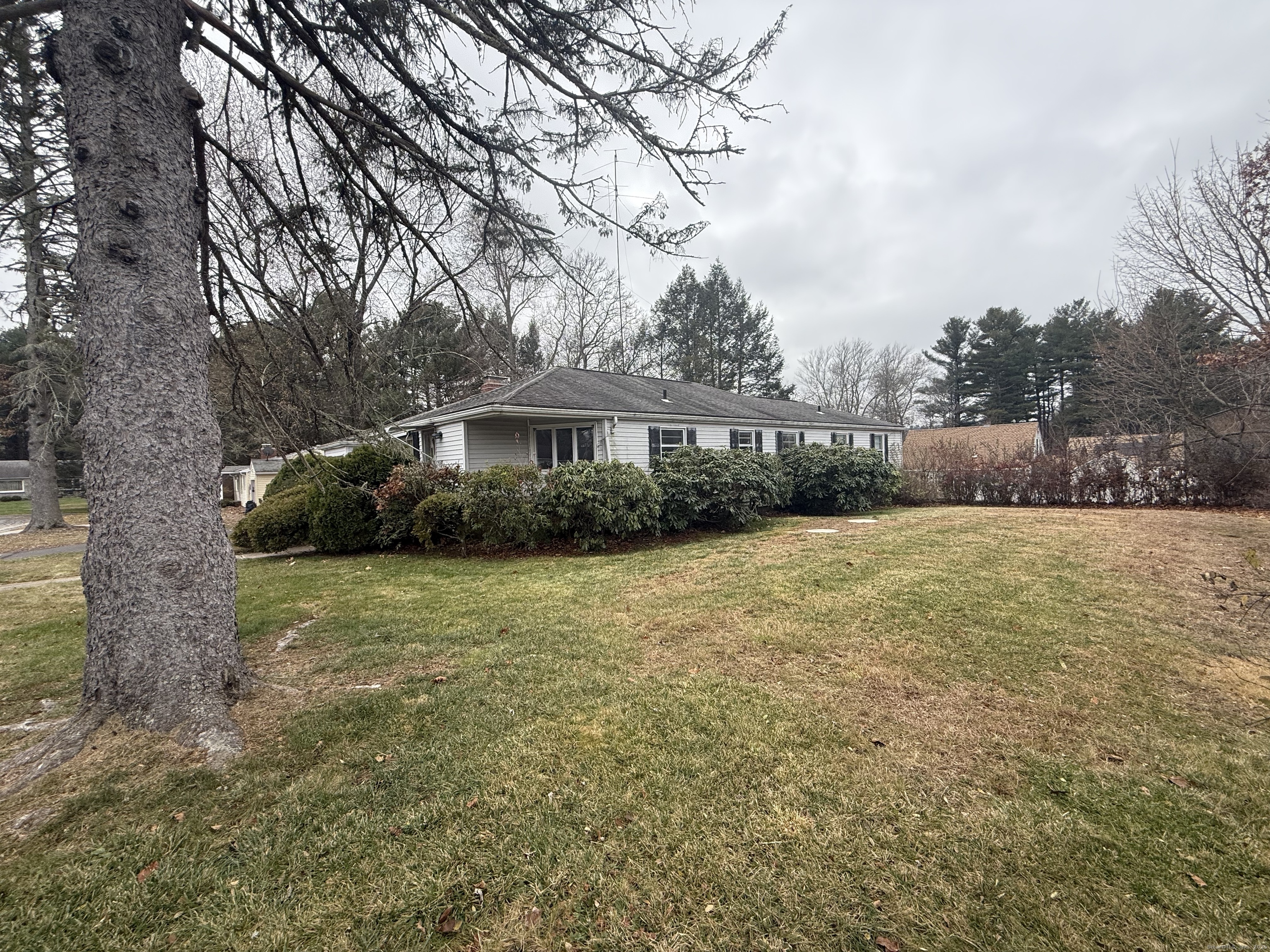 10 Top View Drive Thompson, CT 06262 - Photo 5 of 34 a front view of a house with a yard