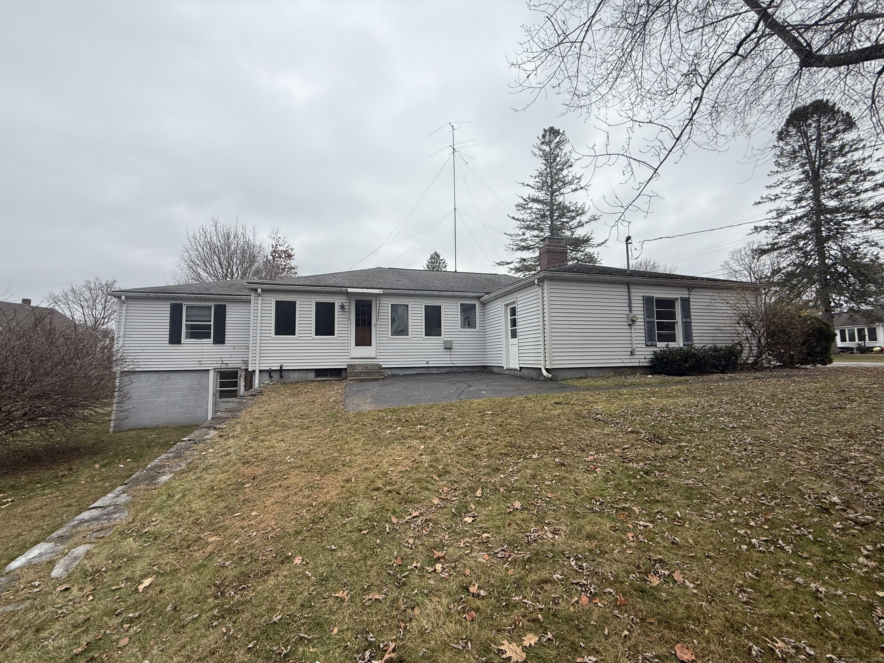 10 Top View Drive Thompson, CT 06262 - Photo 6 of 34 a front view of a house with a garden