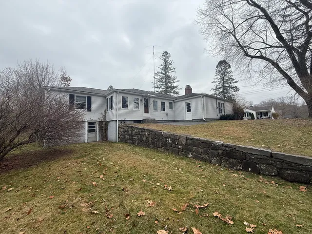 a house view with a garden space