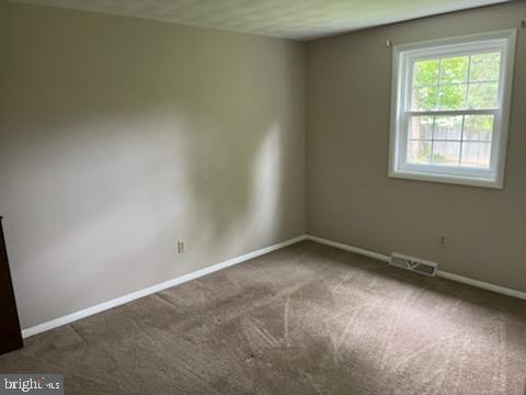 615 Mallard Road, Unit D Camp Hill, PA 17011 - Photo 3 of 3 an empty room with a window